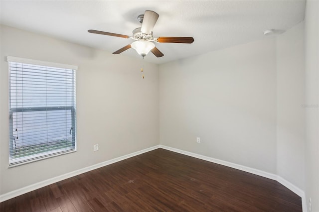 10326 Boggy Moss Dr, Riverview, FL 33578 - empty room featuring baseboards, wood finished floors, and a ceiling fan