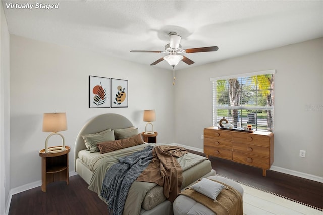10326 Boggy Moss Dr, Riverview, FL 33578 - bedroom featuring baseboards, wood finished floors, and a ceiling fan