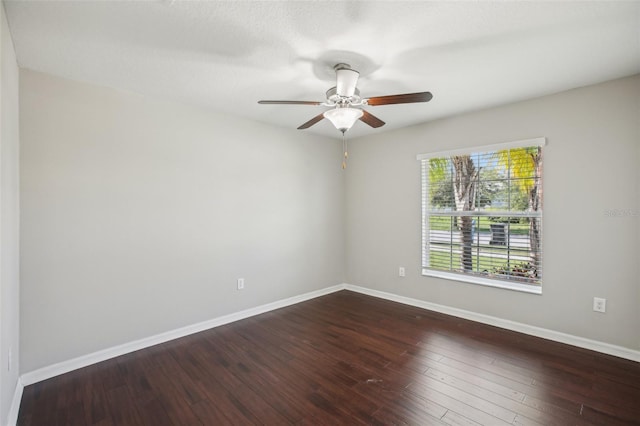 10326 Boggy Moss Dr, Riverview, FL 33578 - empty room with a ceiling fan, baseboards, and dark wood finished floors
