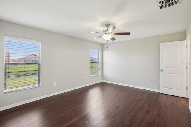 10326 Boggy Moss Dr, Riverview, FL 33578 - unfurnished room with ceiling fan, baseboards, and dark wood-style floors
