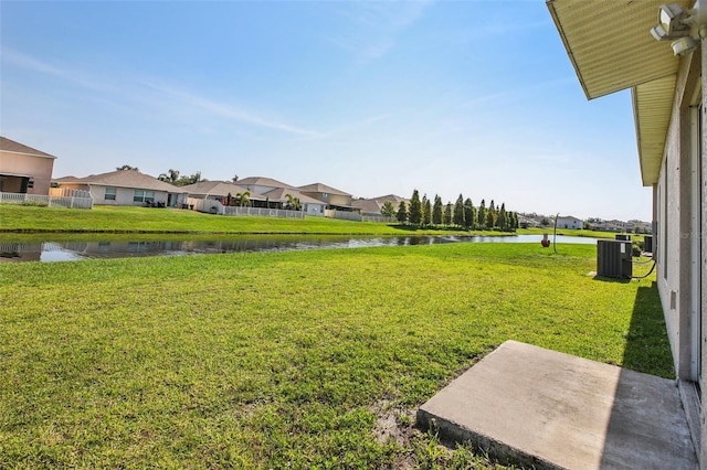 10326 Boggy Moss Dr, Riverview, FL 33578 - view of green lawn featuring a water view, a residential view, and cooling unit