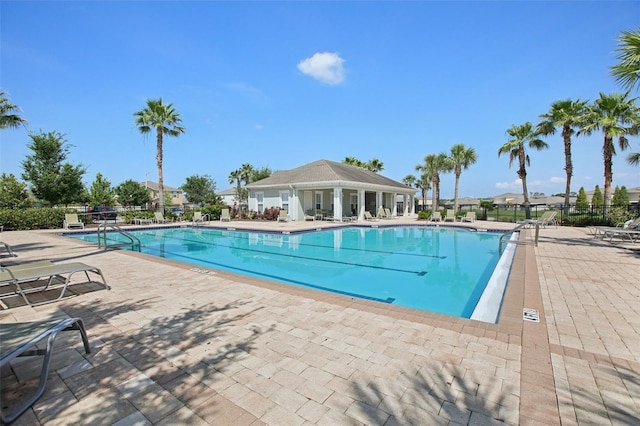 10326 Boggy Moss Dr, Riverview, FL 33578 - community pool featuring a patio area
