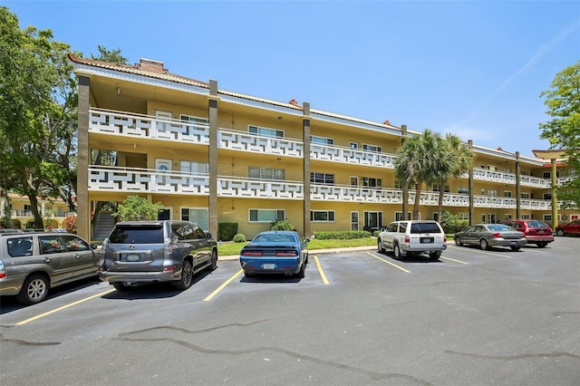 2416 World Parkway Blvd Unit 26, Clearwater, FL 33763 - view of apartment building / complex with uncovered parking