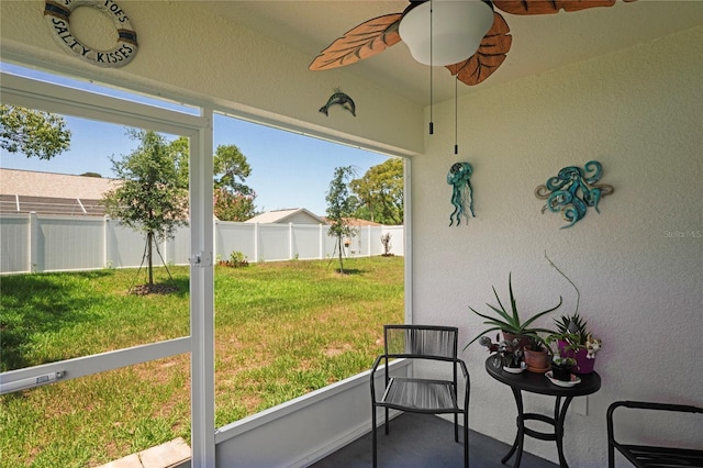 8508 Bay Dr, Spring Hill, FL 34606 - sunroom / solarium with healthy amount of natural light and ceiling fan