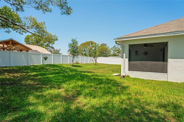 8508 Bay Dr, Spring Hill, FL 34606 - view of yard featuring a ceiling fan