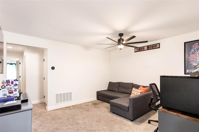 14245 Damselfly Dr, Tampa, FL 33625 - home office with ceiling fan, light carpet, and baseboards