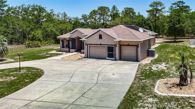 13110 Manistee Rd, Weeki Wachee, FL 34614 - single story home with concrete driveway, cooling unit, an attached garage, and a front lawn