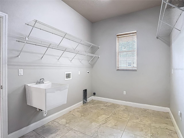 13110 Manistee Rd, Weeki Wachee, FL 34614 - washroom featuring electric dryer hookup, washer hookup, and baseboards