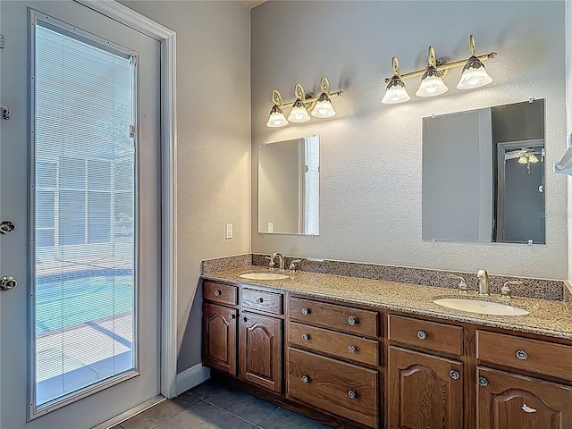 13110 Manistee Rd, Weeki Wachee, FL 34614 - bathroom with tile patterned flooring and double vanity