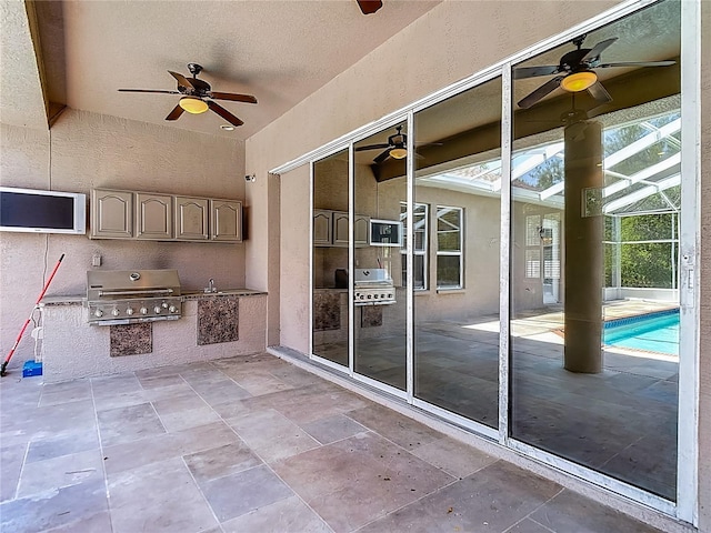 13110 Manistee Rd, Weeki Wachee, FL 34614 - view of patio / terrace featuring a ceiling fan, area for grilling, exterior kitchen, an outdoor pool, and glass enclosure