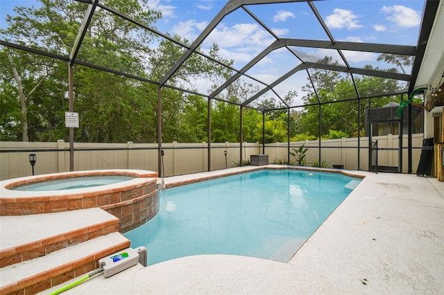 7410 Ambleside Dr, Land O Lakes, FL 34637 - view of pool featuring a pool with connected hot tub and glass enclosure