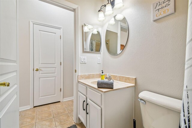 7410 Ambleside Dr, Land O Lakes, FL 34637 - full bath with toilet, tile patterned flooring, and vanity