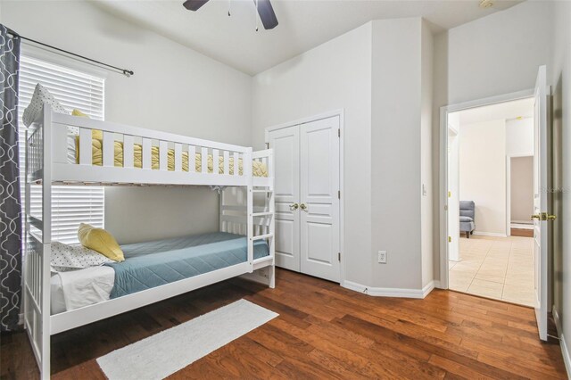 7410 Ambleside Dr, Land O Lakes, FL 34637 - bedroom with wood finished floors, baseboards, a closet, and ceiling fan