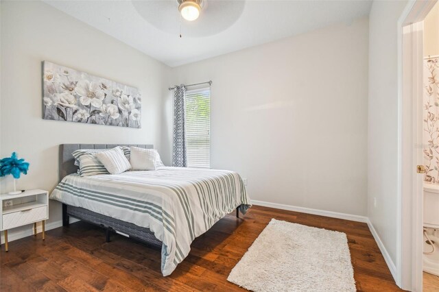 7410 Ambleside Dr, Land O Lakes, FL 34637 - bedroom featuring wood finished floors, baseboards, and a ceiling fan
