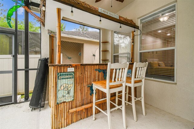 7410 Ambleside Dr, Land O Lakes, FL 34637 - sunroom with a ceiling fan