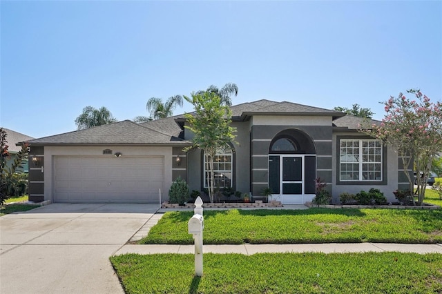 5340 Riva Ridge Dr, Wesley Chapel, FL 33544 - ranch-style home featuring an attached garage, stucco siding, driveway, and a front lawn