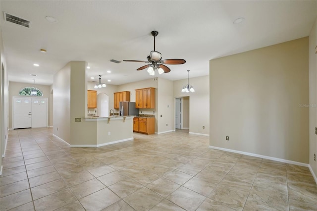 5340 Riva Ridge Dr, Wesley Chapel, FL 33544 - unfurnished living room with ceiling fan, light tile patterned floors, a sink, a chandelier, and recessed lighting