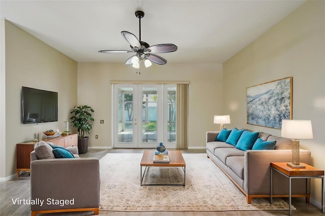 5340 Riva Ridge Dr, Wesley Chapel, FL 33544 - living room with baseboards, ceiling fan, and wood finished floors