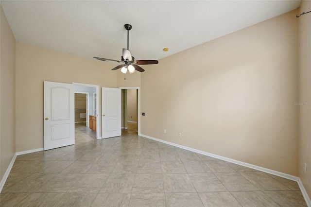 5340 Riva Ridge Dr, Wesley Chapel, FL 33544 - unfurnished bedroom with baseboards and a ceiling fan