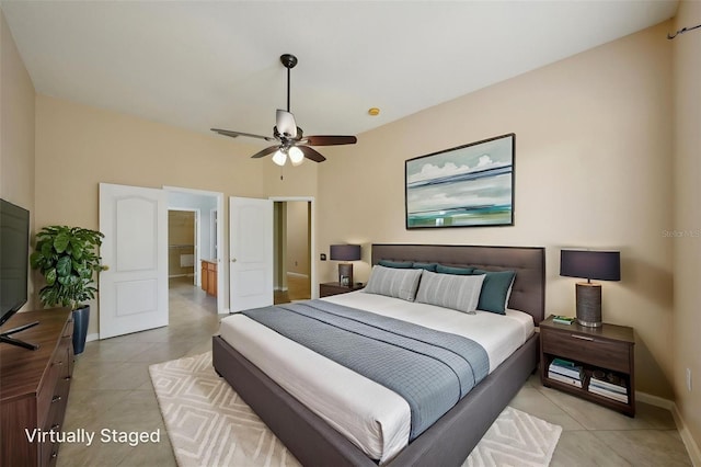 5340 Riva Ridge Dr, Wesley Chapel, FL 33544 - bedroom featuring light tile patterned floors, baseboards, and a ceiling fan