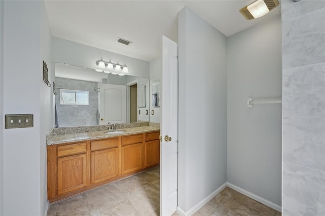 5340 Riva Ridge Dr, Wesley Chapel, FL 33544 - bathroom featuring vanity and a tile shower