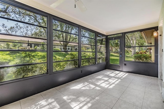 2150 Shelly Dr Unit D, Palm Harbor, FL 34684 - unfurnished sunroom featuring plenty of natural light and a ceiling fan