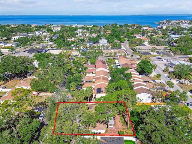 4711 W Vasconia St, Tampa, FL 33629 - aerial perspective of suburban area featuring property parcel outlined and a large body of water