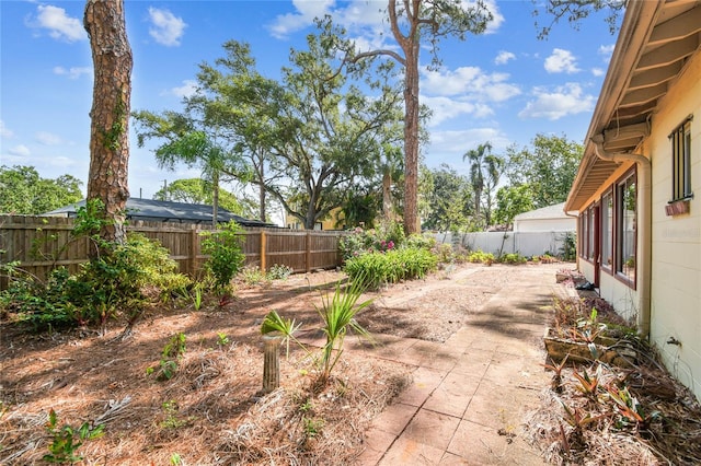 4711 W Vasconia St, Tampa, FL 33629 - fenced backyard featuring a patio
