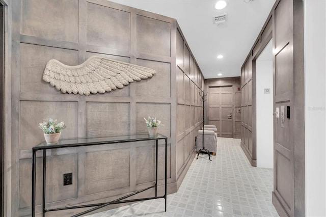555 5th Ave NE Unit 1032, Saint Petersburg, FL 33701 - hallway with a decorative wall and recessed lighting