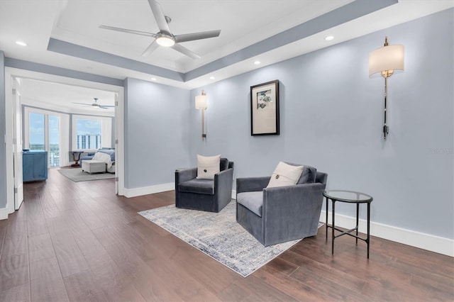 555 5th Ave NE Unit 1032, Saint Petersburg, FL 33701 - sitting room with ceiling fan, a raised ceiling, dark wood-style flooring, baseboards, and recessed lighting