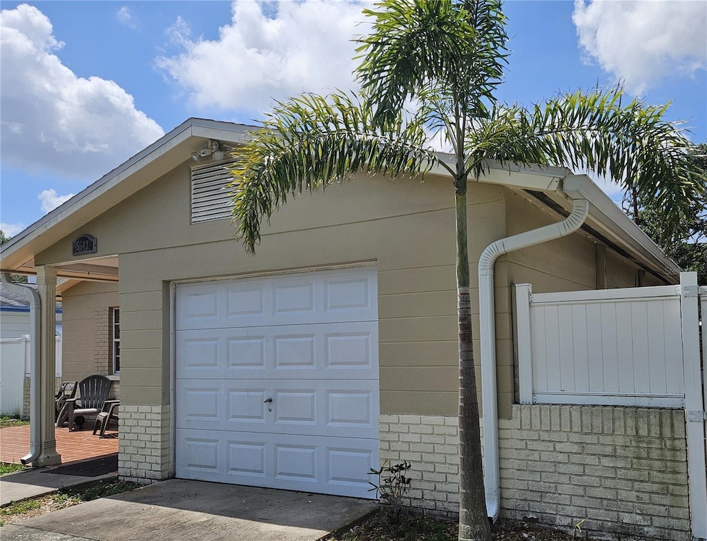 5542 19th Ave N, Saint Petersburg, FL 33710 - garage with concrete driveway