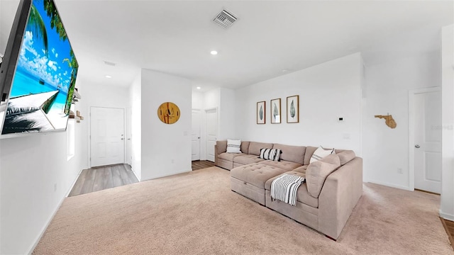 35552 Shade Fern Ln, Zephyrhills, FL 33541 - carpeted living area featuring recessed lighting and baseboards