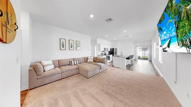 35552 Shade Fern Ln, Zephyrhills, FL 33541 - living room with recessed lighting and baseboards