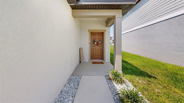 35552 Shade Fern Ln, Zephyrhills, FL 33541 - entrance to property with stucco siding