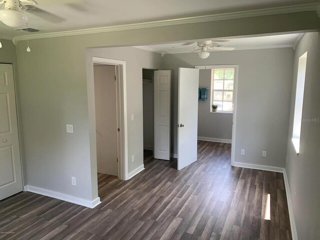 808 Hillsdale Dr, Cocoa, FL 32922 - unfurnished bedroom with dark wood-type flooring, ornamental molding, baseboards, and ceiling fan