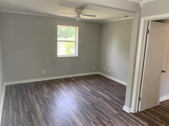 808 Hillsdale Dr, Cocoa, FL 32922 - empty room with crown molding, ceiling fan, dark wood finished floors, and baseboards