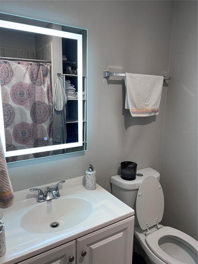 808 Hillsdale Dr, Cocoa, FL 32922 - full bath with toilet, vanity, and a shower with curtain