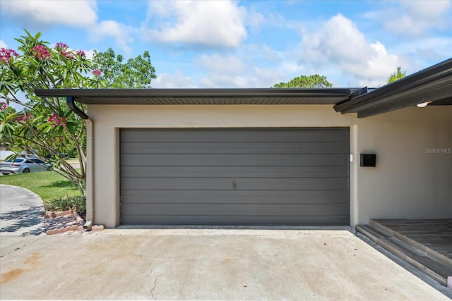 6875 11th Ave N, Saint Petersburg, FL 33710 - garage with concrete driveway