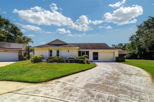 3053 Gregor Ct, Palm Harbor, FL 34684 - single story home with a garage, a front lawn, and concrete driveway
