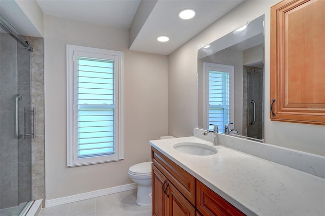 3053 Gregor Ct, Palm Harbor, FL 34684 - bathroom with toilet, vanity, a stall shower, plenty of natural light, and recessed lighting