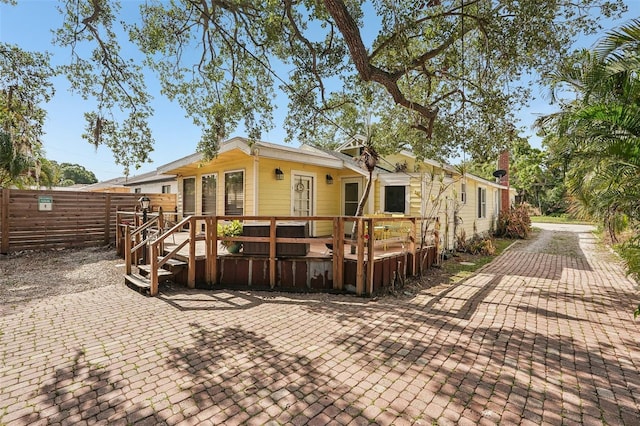 2245 Bahia Vista St, Sarasota, FL 34239 - view of front of house featuring a wooden deck and a patio