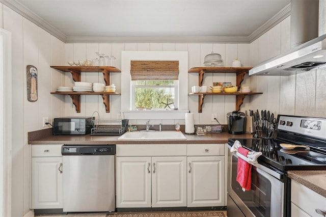 2245 Bahia Vista St, Sarasota, FL 34239 - kitchen featuring stainless steel appliances, wall chimney exhaust hood, a sink, open shelves, and ornamental molding