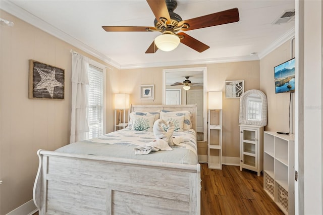 2245 Bahia Vista St, Sarasota, FL 34239 - bedroom with wood finished floors, crown molding, multiple windows, baseboards, and a ceiling fan