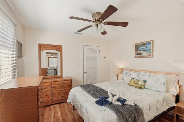 2245 Bahia Vista St, Sarasota, FL 34239 - bedroom with light wood finished floors and a ceiling fan