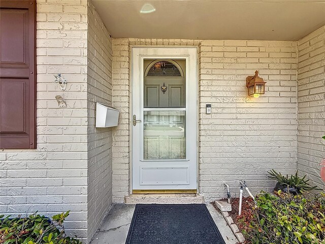 602 Mindy Dr, Largo, FL 33771 - property entrance with brick siding