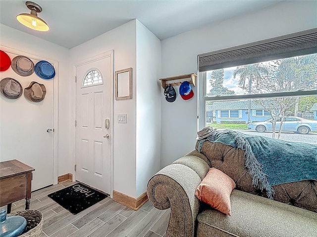 602 Mindy Dr, Largo, FL 33771 - foyer with wood finish floors and baseboards