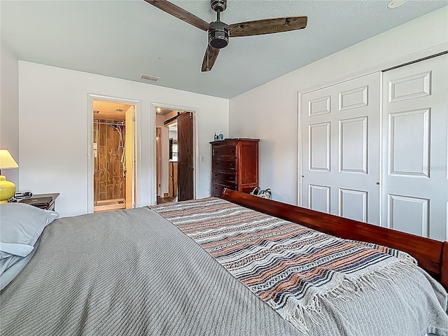 602 Mindy Dr, Largo, FL 33771 - carpeted bedroom featuring a closet, ceiling fan, and connected bathroom