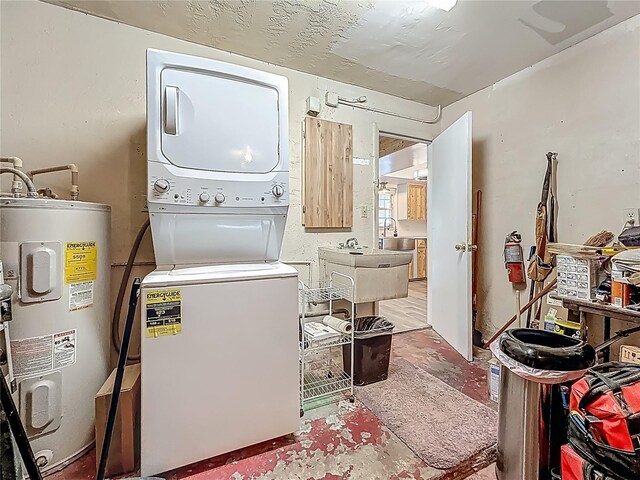 602 Mindy Dr, Largo, FL 33771 - washroom featuring stacked washer and clothes dryer and electric water heater