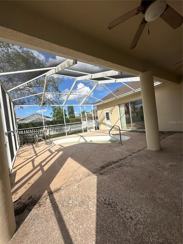 13632 Deventer Ct, Hudson, FL 34667 - view of swimming pool with a ceiling fan, a patio, and glass enclosure