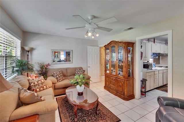 3626 S Hesperides St, Tampa, FL 33629 - living room featuring light tile patterned floors and ceiling fan